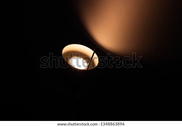 transition of dark to\
light with lamp\
light