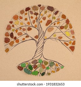 Transitory art arrangement - tree drawn on craft paper and and assortment of seaglass collected on beaches of Gran Canaria, 
representing seasonal change
