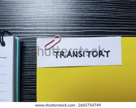 Transitory writting on table background.