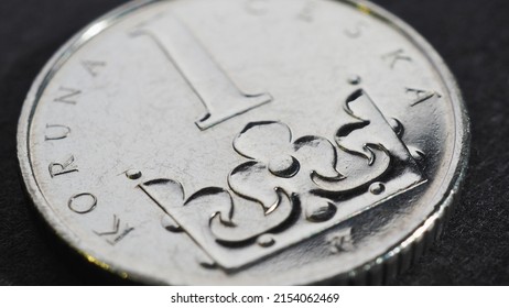 Translation: 1 Czech crown. National currency of Czechia. Czech one crown coin closeup. Illustration for news about banking or finance. Macro - Shutterstock ID 2154062469
