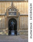 translation is "Academicians of Oxford, Thomas Bodley has built this library for you and for the Republic of the Learned. May the gift turn out well." statue of William Herbert 3rd Earl of Pembroke