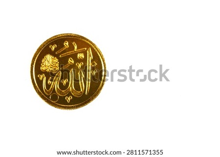 Translation of the Arabic text (Allah the almighty), on an Islamic gold Sovereign coin, made of 21K gold purity and is used for both investment and jewelry