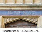 translation is Bodleian Library School of Ancient Jurisprudence or Law on one of the doors to a building in the main library quad near the Radcliffe Camera and the Sheldonian Theatre