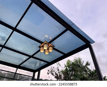 A translucent acrylic roof with black steel structure. - Powered by Shutterstock