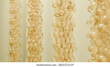 A translucent beads create stunning visual display, showcasing intricate patterns and textures. warm tones evoke sense