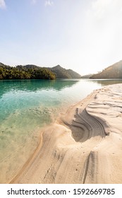 Translucent Clear Waters Of Tropical Islands In Raja Ampat, Indonesia