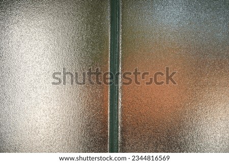 Translucent frosted glass. Rough texture in semi-transparent glass. Office window or door. Pattern, Textured.