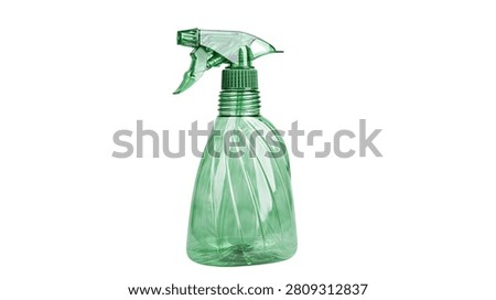 Translucent green plastic spray bottle with trigger nozzle