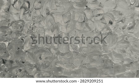 Translucent melted Plastic Polymer Material Scraps on Industrial Surface, Recycled Plastic Waste and Manufacturing Raw Material Concept