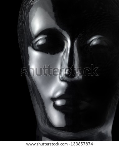 translucent reflective human head made of glass in black back