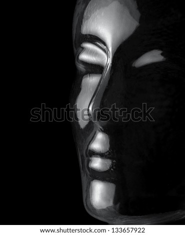 translucent reflective human head made of glass in black back