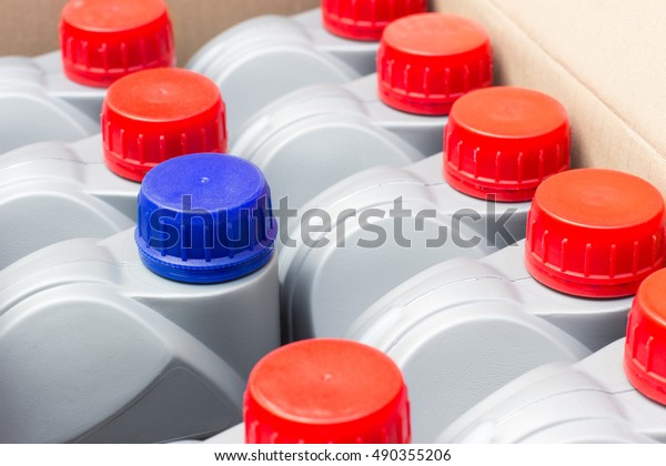 Transmission oil bottle in a cardboard box.\
horizontal shot