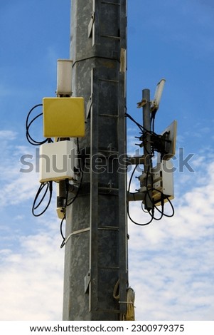 transmitter pole on sunset background