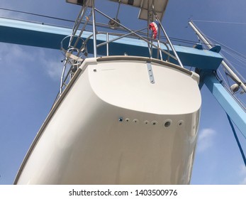 Transom Sail Yacht With Blue Sky Background.