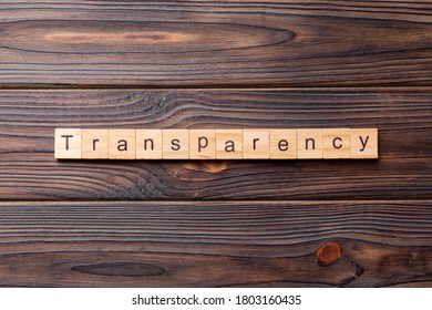 Transparency Word Written On Wood Block. Transparency Text On Table, Concept.