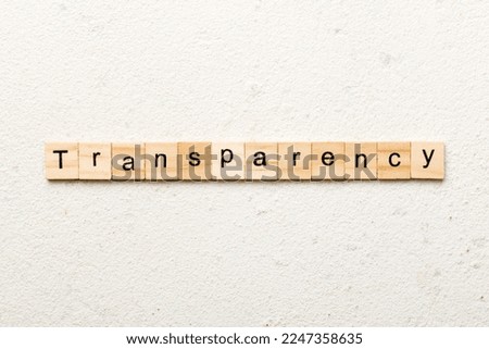 transparency word written on wood block. transparency text on table, concept.