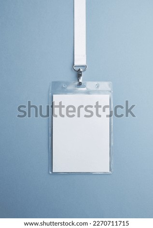 Transparent badge mockup isolated on blue background. Plain empt