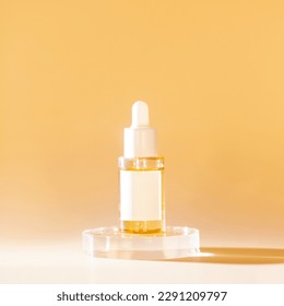 Transparent bottle with dropper with a beauty serum on podium  on yellow background. Glass packaging for cosmetic product, essential aroma oil. Skin care, hydration and Vitamin C with collagen.
