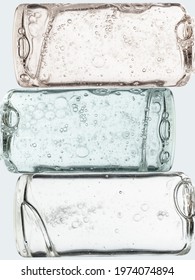 Transparent bottles of cosmetic moisturizer toner, serum or water background