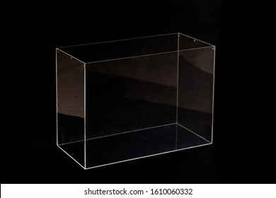 Transparent Box Made Of Organic Glass Stands On A Black Background
