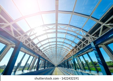 Transparent Bridge Tunnel Inside View. Tunnel Bridge For Pedestrians. Modern Glass Footbridge