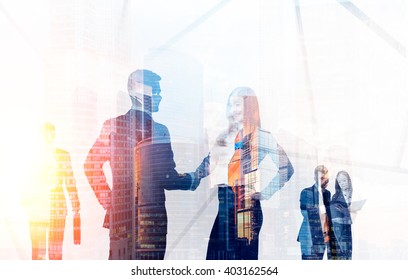 Transparent businesspeople silhouettes on Moscow city background. Double Exposure