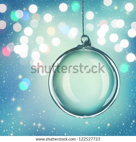  Transparent christmas ball on abstract blue background