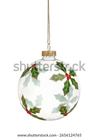 Transparent Christmas tree decoration with a pattern of holly berries isolated on a white background
