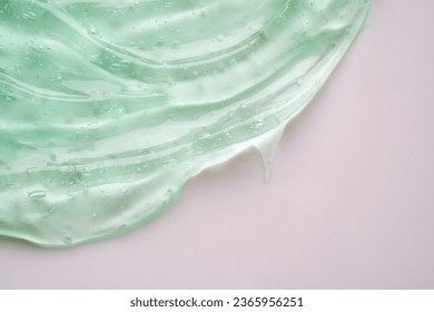 Transparent clear green liquid serum gel cosmetic texture background - Shutterstock ID 2365956251