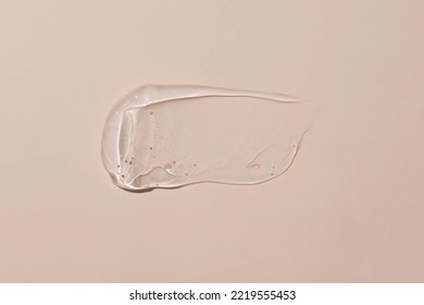 Transparent Cosmetic Gel Cream Texture, Skincare Lotion Swatch On Pastel Background. Face Creme, Body Moisturiser, Hair Conditioner Smear Smudge Stroke. Glicerin Beauty Product Closeup