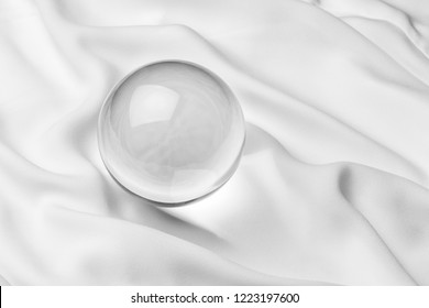 Transparent Crystal Ball With White Background , Close Up.