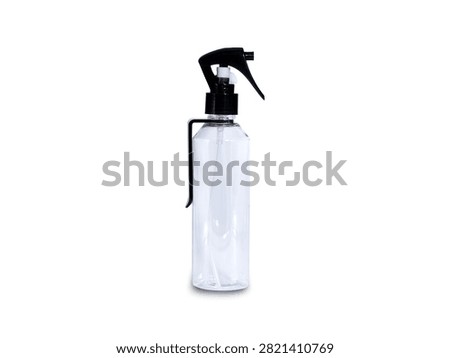 Transparent empty plastic spray bottle with a black trigger sprayer isolated on a white background. A reusable fine mist spray bottle suitable for barbershops, hair salons, cleaning solutions, gardening, cosmetic products, and household use. Minimal product mockup with copy space.