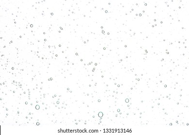 Transparent gel with bubbles close-up. The texture of gel cream. Oxygen bubbles in clear blue water, close-up. Mineral water. Water enriched with oxygen. - Powered by Shutterstock