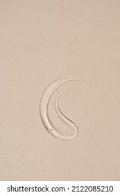 Transparent Gel Smear, Smudge On Beige Background. Aesthetic Beauty Product Concept