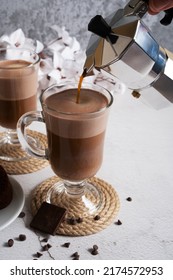 Transparent Glass With Chocolate Oat Milk And Natural Coffee Latte. Vertical Orientation