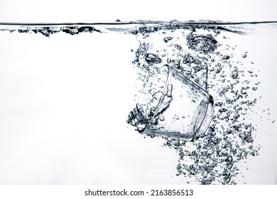 Transparent Glass Dropped Into Water On Stock Photo 2163856513 ...