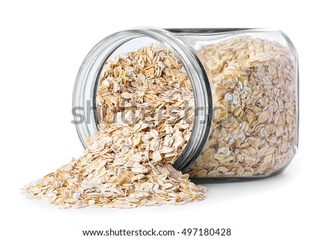 Transparent glass jar with rolled oats isolated on white background