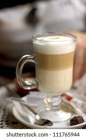 Transparent Glass With Latte In A Cafe