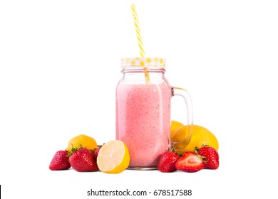 A Transparent Mason Jar With A Handle Full Of Tasty Strawberry Smoothie From Sweet Berries, Organic Milk And Juicy Lemons, Isolated On A White Background. Fresh Strawberry And A Lemon Smoothie. Fruits