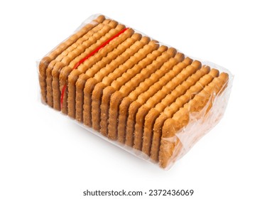 Transparent packaging of biscuits. A pack of cookies on a white background. Biscuits in cellophane packaging.