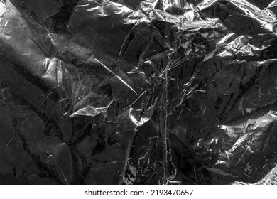 Transparent Plastic Bag Film Wrap Overlay Texture On Black Background