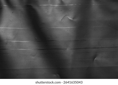 transparent plastic bag wrap overlay texture on black background