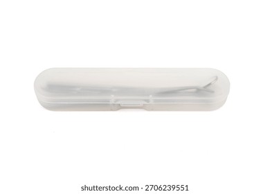 Transparent plastic case with a pair of scissors inside.