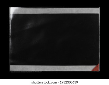 Transparent Plastic Wrap On The Black Background. Clean Blank Texture Overlay Effect Template. Isolated Wrinkle Surface Branding Mock-up. Black Pack Packaging Bag.