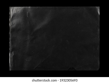 Transparent plastic wrap on the black background. Clean blank texture overlay effect template. Isolated wrinkle surface branding mock-up. Black pack packaging bag. - Shutterstock ID 1932305693