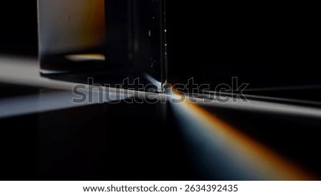 Transparent Prism with Light and Shadow in Focus