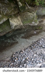A transparent river with rocks