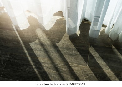 transparent tulle with morning sun rays on shadow background. - Shutterstock ID 2159820063