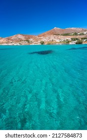 Transparent turquoise waters in Kolybithres, bay of Naousa, Paros island, Cyclades, Greece