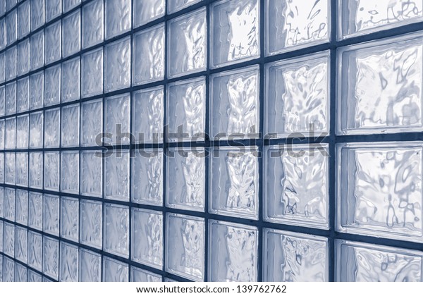 transparent white light abstract art pattern\
glass cube texture block wall construction square shape\
background.concept idea for modern interior decoration or save\
energy material\
design.